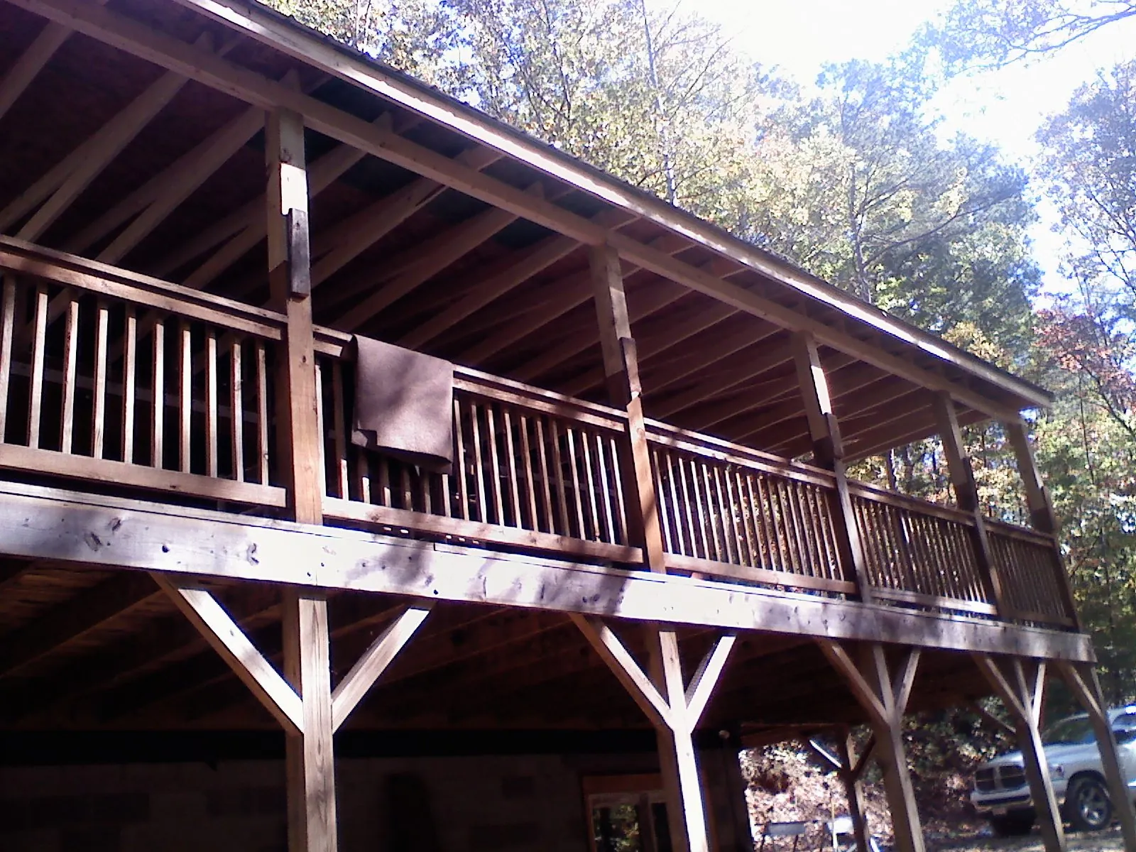 Timber framing under a new elevated porch and deck — Roof Leak Repair in Palco by Roofing Brothers